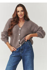 Oppdag vårt utvalg av stilfulle Brun Cardigan Makadamia til dame i ulike størrelser og kvalitetsmaterialer - perfekte til jobb, fritid og alle dager. Rask levering og gode priser hos MS Stylehaven. se mer!